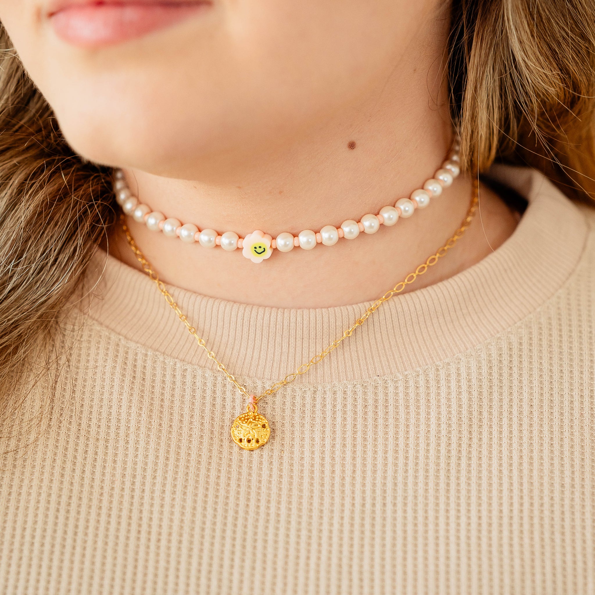Collar perla cara feliz